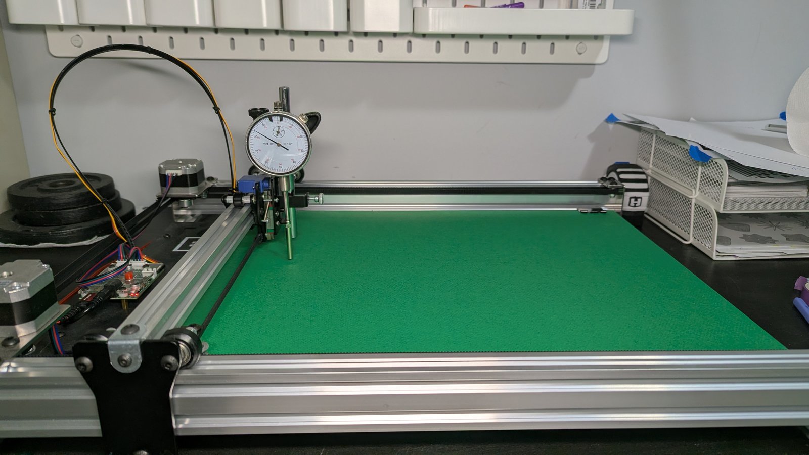 The old routine: a dial indicator finding the belly in the A3 machine's bed.